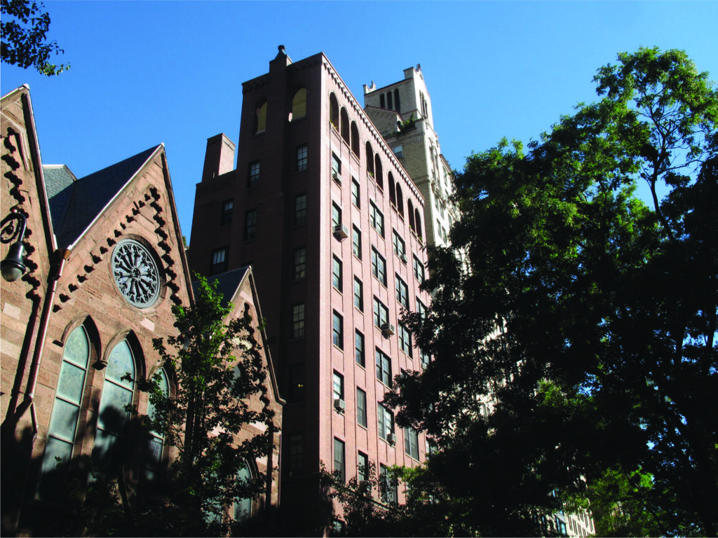 A church next to an apartment building